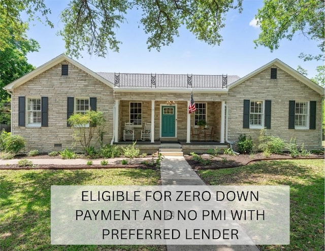 1922 W Lake Dr, Taylor, TX 76574 - view of front of house with covered porch and stone siding