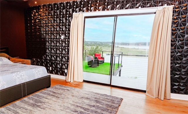 1800 Buffalo Gap Rd, Austin, TX 78734 - bedroom with access to exterior and wood finished floors