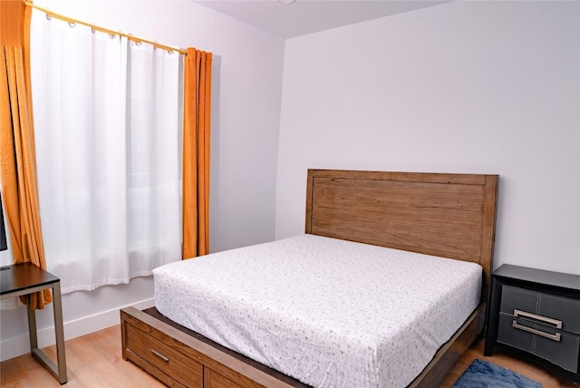 1800 Buffalo Gap Rd, Austin, TX 78734 - bedroom with light wood finished floors and baseboards