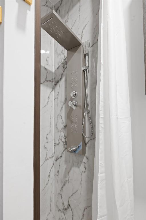 1800 Buffalo Gap Rd, Austin, TX 78734 - bathroom featuring a marble finish shower