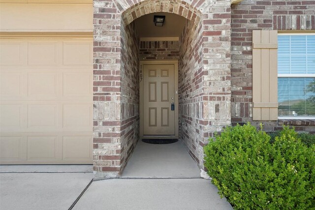 1407 Brashear Ct, Cedar Park, TX 78613 - entrance to property with brick siding and a garage