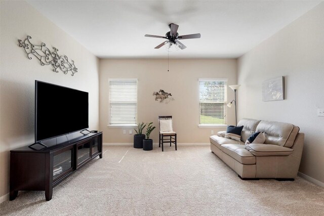 1407 Brashear Ct, Cedar Park, TX 78613 - carpeted living room featuring a ceiling fan and baseboards