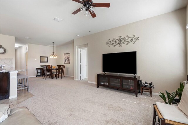 1407 Brashear Ct, Cedar Park, TX 78613 - living room featuring light carpet and ceiling fan