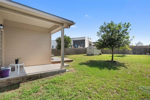 1407 Brashear Ct, Cedar Park, TX 78613 - fenced backyard with a storage unit and a patio area