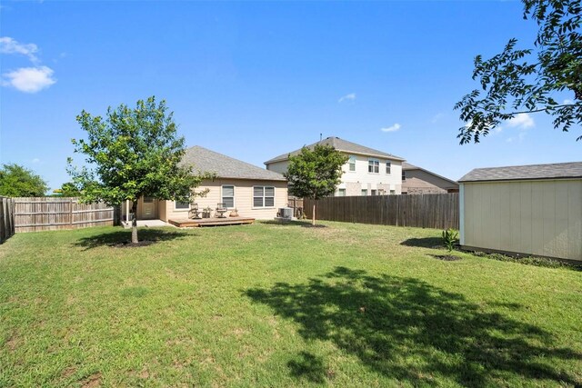 1407 Brashear Ct, Cedar Park, TX 78613 - fenced backyard with an outdoor structure and a deck