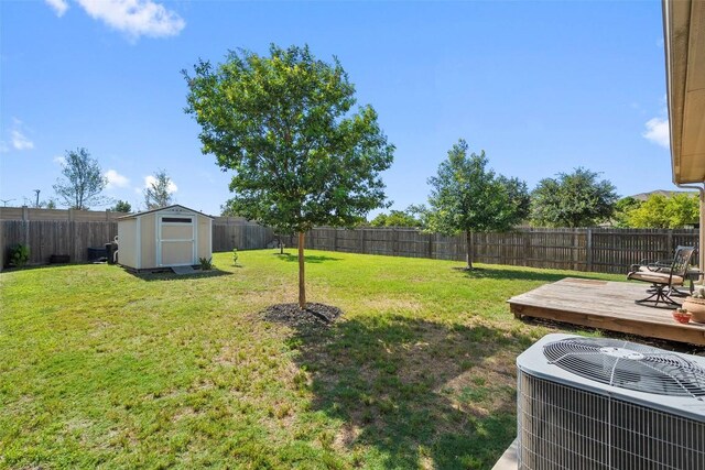 1407 Brashear Ct, Cedar Park, TX 78613 - fenced backyard featuring a storage shed and a wooden deck