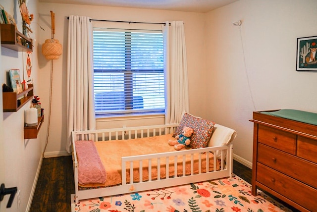 2152 Stonecrest Path, New Braunfels, TX 78130 - bedroom with baseboards and wood finished floors