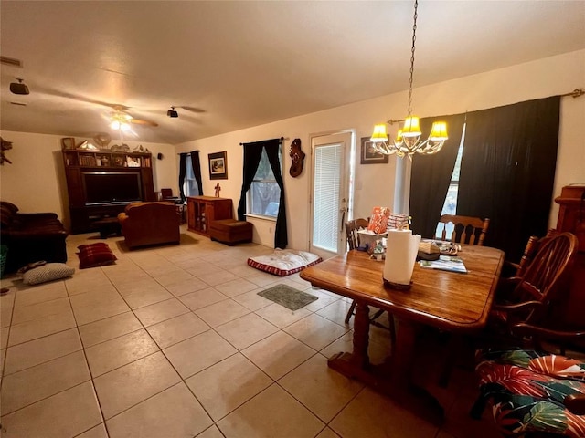 4113 Natural Bridge Ct, Round Rock, TX 78681 - dining area with a chandelier, light tile patterned floors, and ceiling fan