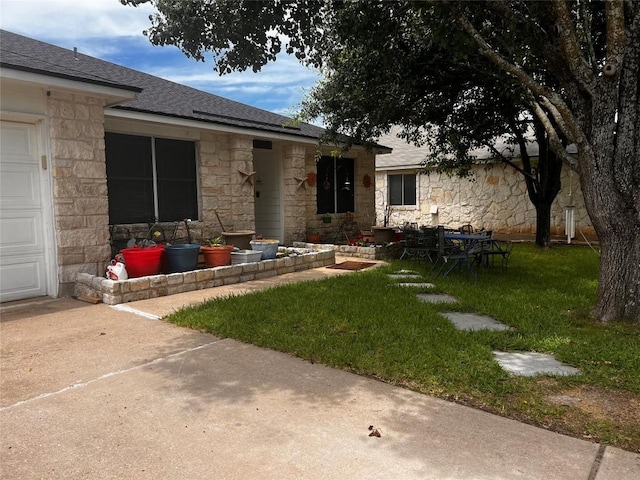 4113 Natural Bridge Ct, Round Rock, TX 78681 - view of grassy yard with a garage and concrete driveway