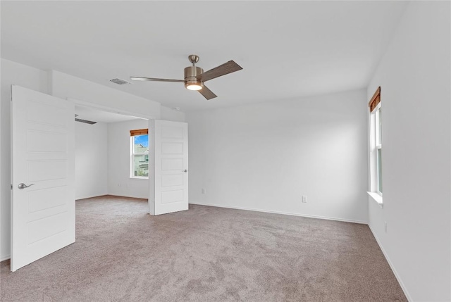 13308 Nancy Reagan St, Manor, TX 78653 - spare room with carpet flooring and a ceiling fan