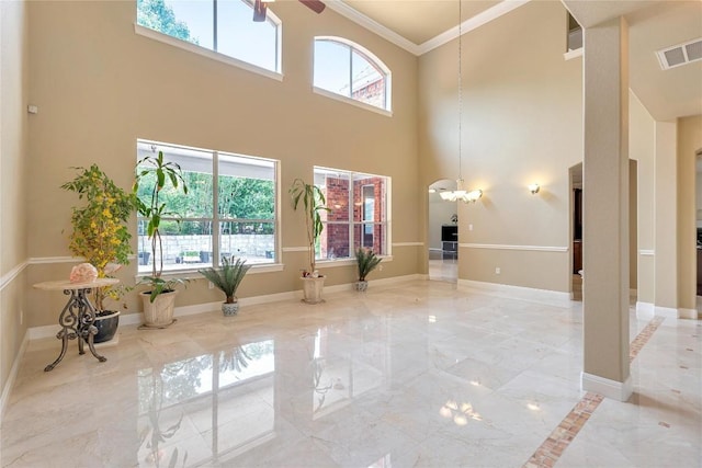 222 Vailco Ln, Austin, TX 78738 - community lobby featuring crown molding and a high ceiling