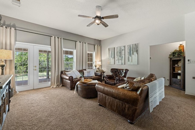 1201 County Road 229, Florence, TX 76527 - living area with carpet floors, ceiling fan, french doors, and a textured ceiling