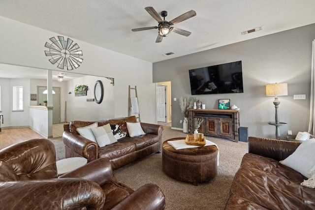 1201 County Road 229, Florence, TX 76527 - living area with a ceiling fan and light colored carpet