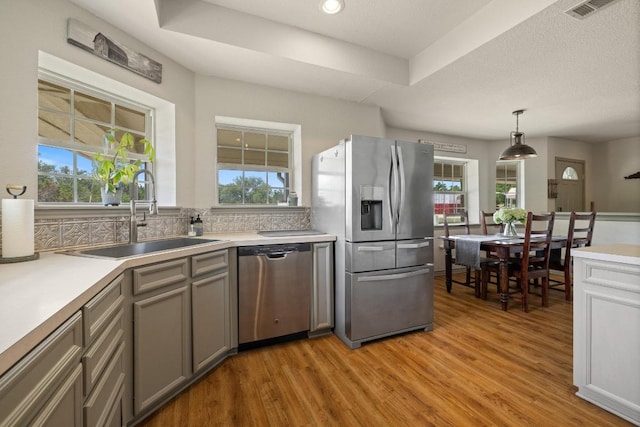 1201 County Road 229, Florence, TX 76527 - kitchen with appliances with stainless steel finishes, healthy amount of natural light, light wood finished floors, and recessed lighting