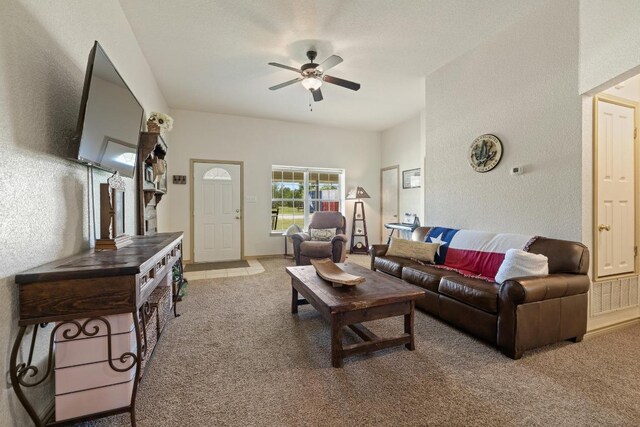 1201 County Road 229, Florence, TX 76527 - living room featuring light colored carpet, a textured wall, and ceiling fan