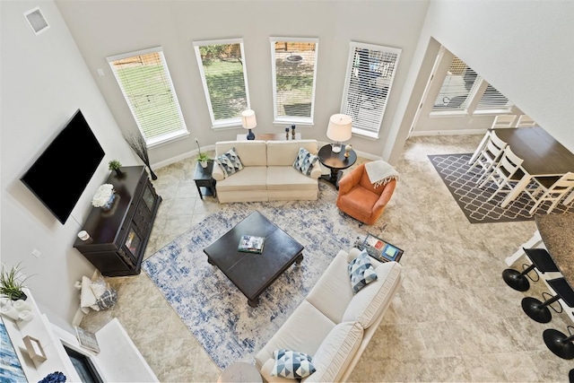 4225 Borho Ranch St, Leander, TX 78641 - tiled living area with baseboards