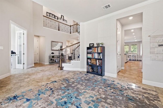 4225 Borho Ranch St, Leander, TX 78641 - entrance foyer featuring stairway, ornamental molding, tile patterned flooring, and recessed lighting