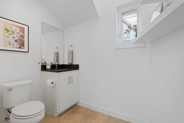 2500 Southland Dr Unit B, Austin, TX 78704 - bathroom featuring vanity, speckled floor, and lofted ceiling