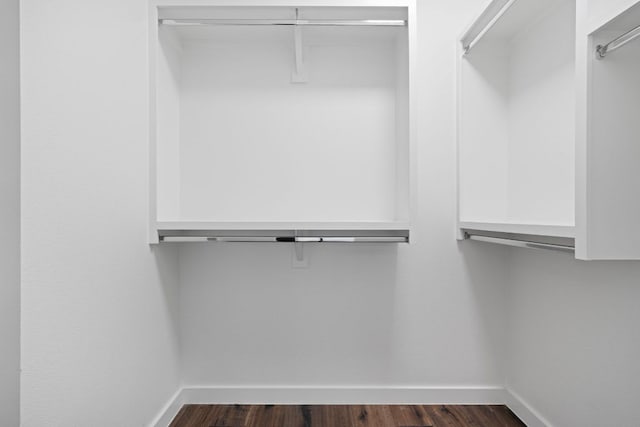 2500 Southland Dr Unit B, Austin, TX 78704 - walk in closet with dark wood-style floors