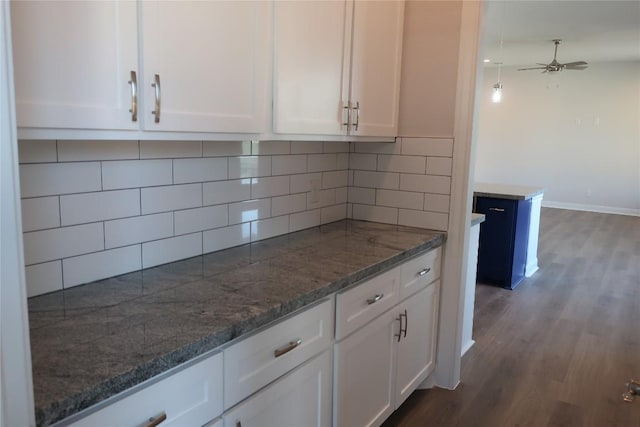 119 Waimanalo Dr, Bastrop, TX 78602 - kitchen with white cabinetry and dark wood-style floors