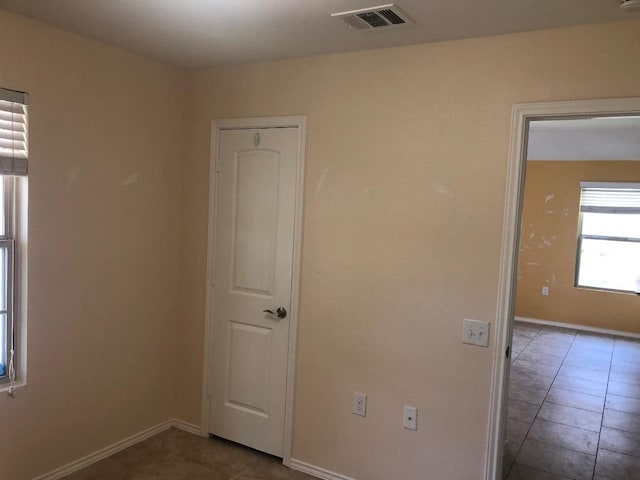 3505 Breckenridge Dr, Austin, TX 78744 - tiled empty room featuring baseboards