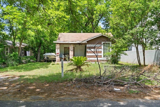 1114 Linden St Unit 2, Austin, TX 78702 - view of property hidden behind natural elements featuring covered porch