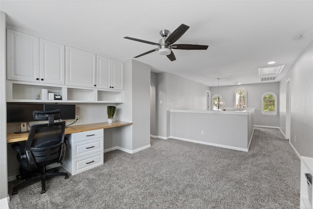 3431 Ranch Park Trl, Round Rock, TX 78681 - carpeted office space featuring built in desk, a ceiling fan, and attic access