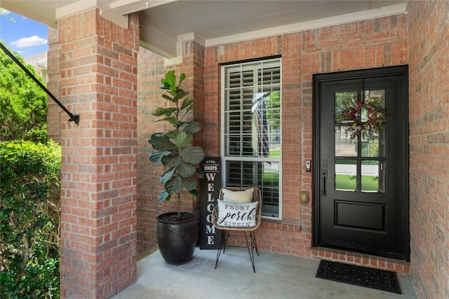 3431 Ranch Park Trl, Round Rock, TX 78681 - doorway to property with brick siding and a porch