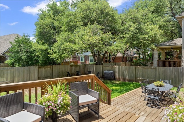 3431 Ranch Park Trl, Round Rock, TX 78681 - wooden deck featuring outdoor dining space and a fenced backyard