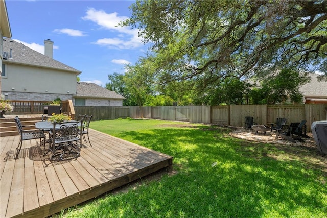 3431 Ranch Park Trl, Round Rock, TX 78681 - fenced backyard featuring an outdoor fire pit, outdoor dining space, and a deck