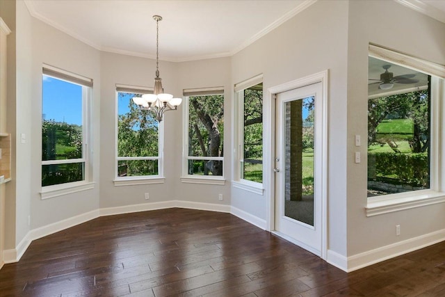 138 Top O The Lake Dr, Lakeway, TX 78734 - unfurnished dining area with a chandelier, dark wood-style floors, and ornamental molding
