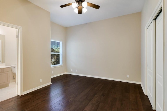138 Top O The Lake Dr, Lakeway, TX 78734 - unfurnished bedroom with wood finished floors, connected bathroom, a closet, and a ceiling fan