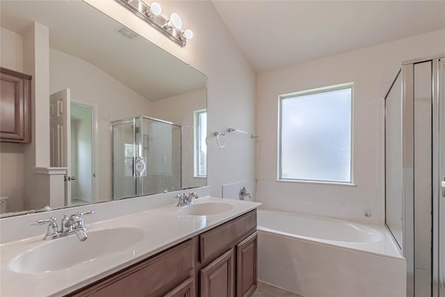 1504 Morning Mist Ln, Pflugerville, TX 78660 - bathroom with a garden tub, a shower stall, double vanity, and vaulted ceiling