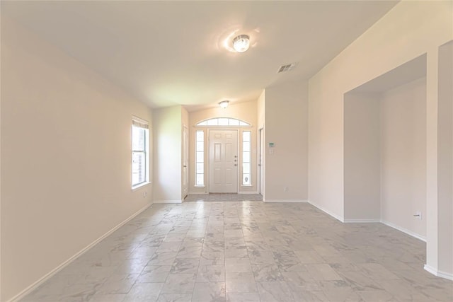 1504 Morning Mist Ln, Pflugerville, TX 78660 - entryway with light marble finish floors and baseboards