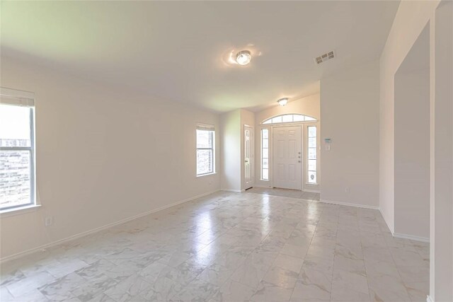 1504 Morning Mist Ln, Pflugerville, TX 78660 - entryway with light marble finish floors and vaulted ceiling