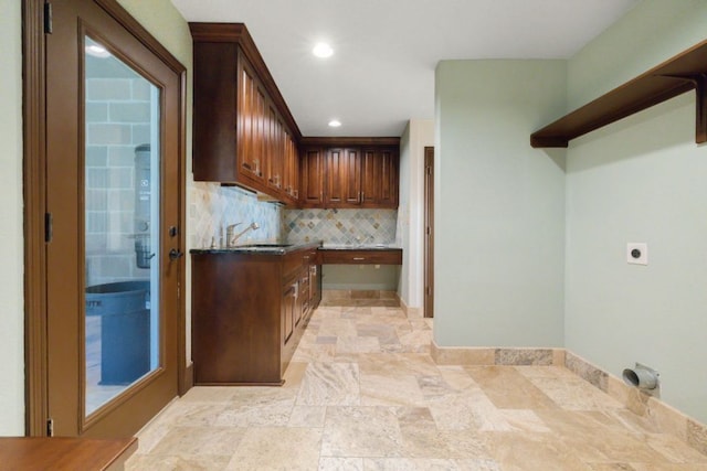 10810 River Terrace Cir, Austin, TX 78733 - laundry area featuring electric dryer hookup, recessed lighting, and light stone finish floors