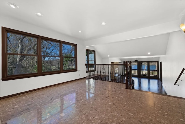 10810 River Terrace Cir, Austin, TX 78733 - spare room with granite tiled floors, vaulted ceiling, and recessed lighting