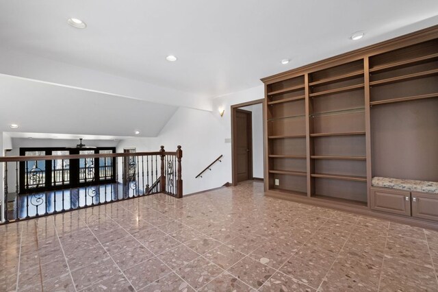 10810 River Terrace Cir, Austin, TX 78733 - spare room featuring recessed lighting, lofted ceiling, and built in shelves