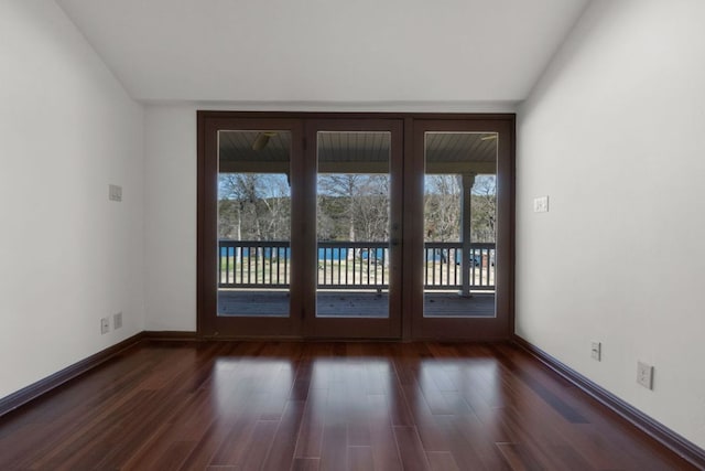 10810 River Terrace Cir, Austin, TX 78733 - empty room with healthy amount of natural light and dark wood finished floors