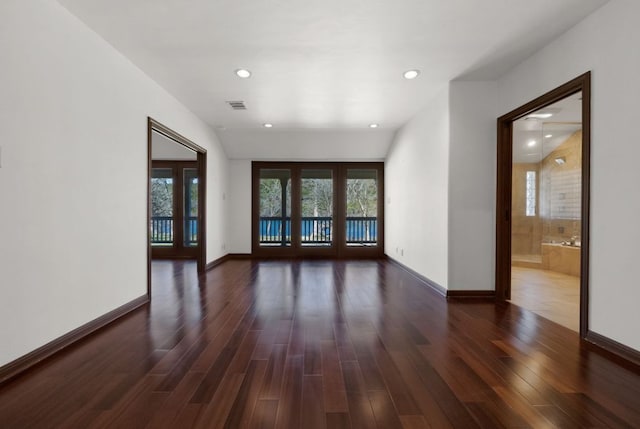 10810 River Terrace Cir, Austin, TX 78733 - empty room featuring dark wood-type flooring and recessed lighting