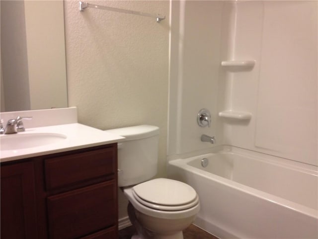 13701 Abraham Lincoln St, Manor, TX 78653 - full bath with vanity, a textured wall, and  shower combination