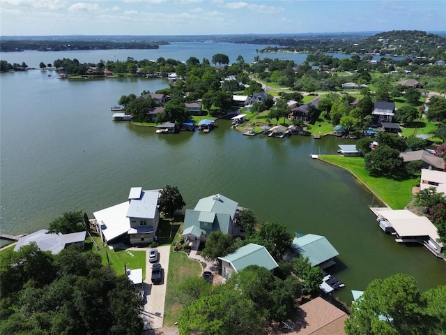 134 Glen Oaks Dr, Sunrise Beach, TX 78643 - aerial view of residential area with a nearby body of water