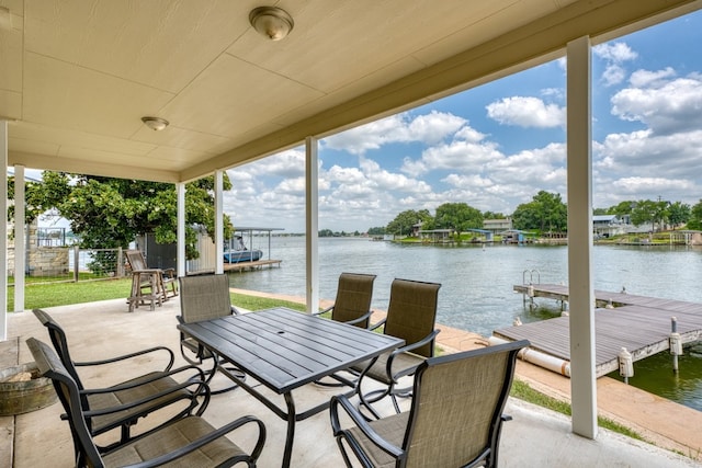 134 Glen Oaks Dr, Sunrise Beach, TX 78643 - view of patio with a dock and a water view