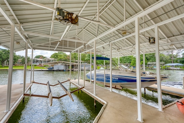 134 Glen Oaks Dr, Sunrise Beach, TX 78643 - dock with boat lift and a water view