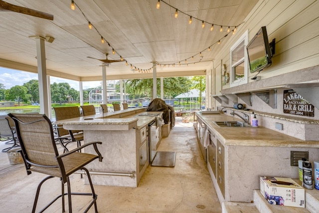 134 Glen Oaks Dr, Sunrise Beach, TX 78643 - view of patio with area for grilling and ceiling fan