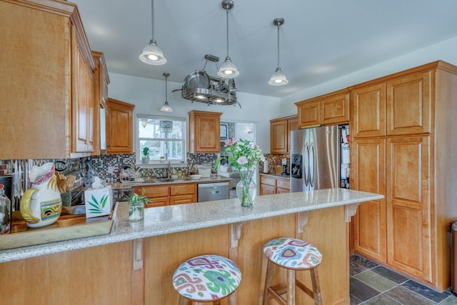 134 Glen Oaks Dr, Sunrise Beach, TX 78643 - kitchen with stainless steel appliances, a peninsula, decorative backsplash, and light stone countertops