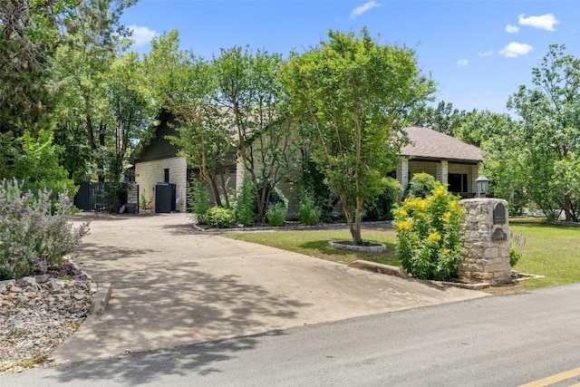 103 Schooner Dr, Lakeway, TX 78738 - view of property hidden behind natural elements