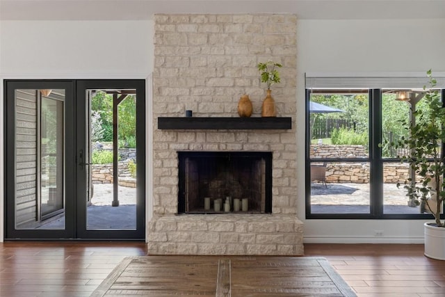 103 Schooner Dr, Lakeway, TX 78738 - unfurnished living room with wood-type flooring and plenty of natural light