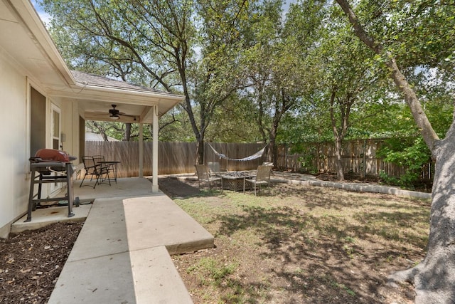 1109 Pine Portage Loop, Leander, TX 78641 - fenced backyard with ceiling fan and a patio