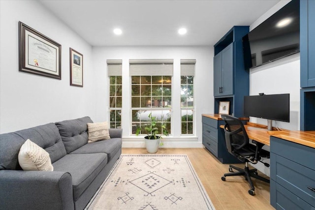 5304 China Garden Dr, Austin, TX 78730 - home office featuring light wood-style floors and recessed lighting